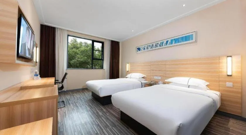 Bed in Jtour Inn Huanggang Hongan Lieshi Lingyuan