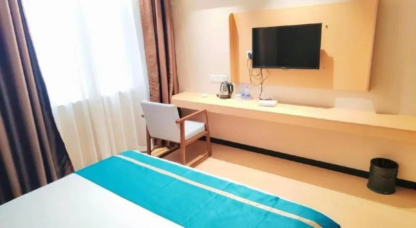 Bed in JTOUR Inn Maoming Gaozhou Guabangling Park