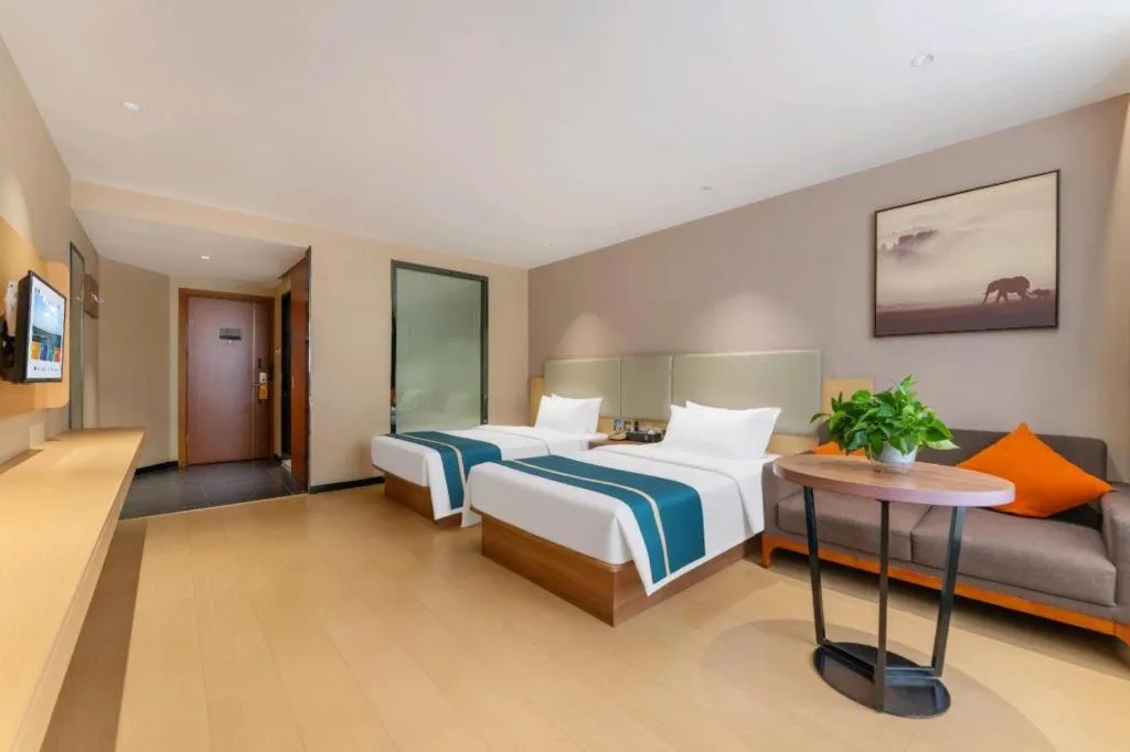 Bed in JTOUR Inn Maoming Gaozhou Guabangling Park