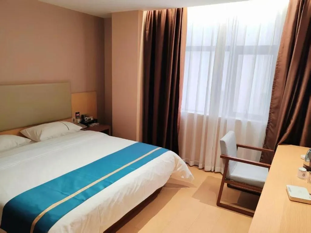 Bed in JTOUR Inn Maoming Gaozhou Guabangling Park