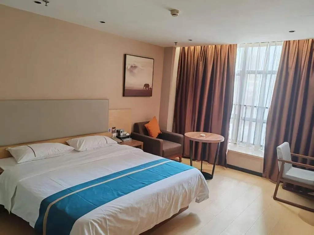 Bed in JTOUR Inn Maoming Gaozhou Guabangling Park