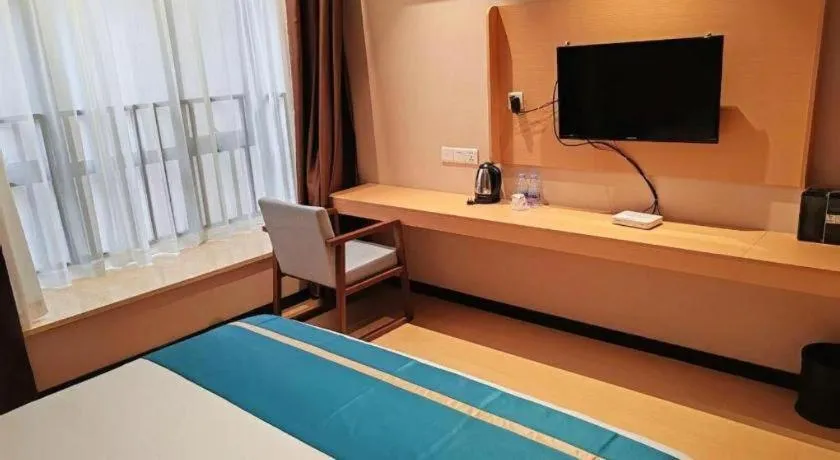 Bed in JTOUR Inn Maoming Gaozhou Guabangling Park