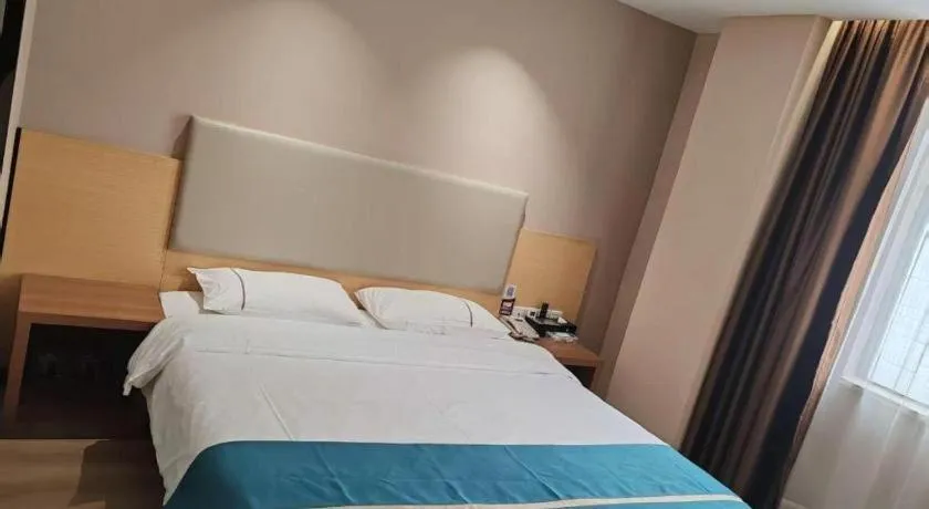 Bed in JTOUR Inn Maoming Gaozhou Guabangling Park