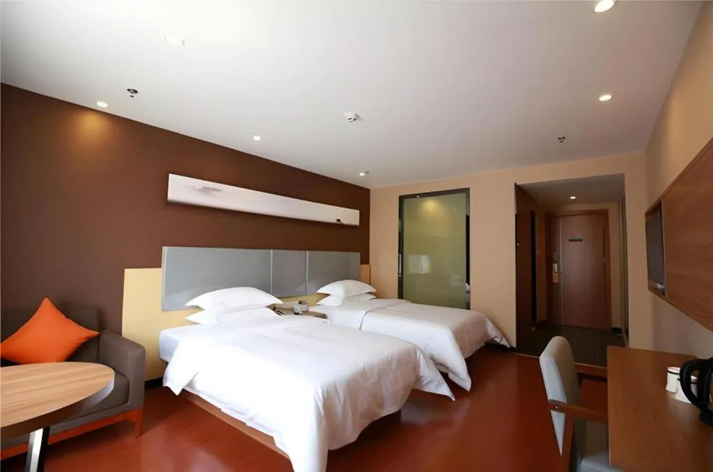 Bed in JTOUR Inn Maoming Gaozhou Guabangling Park