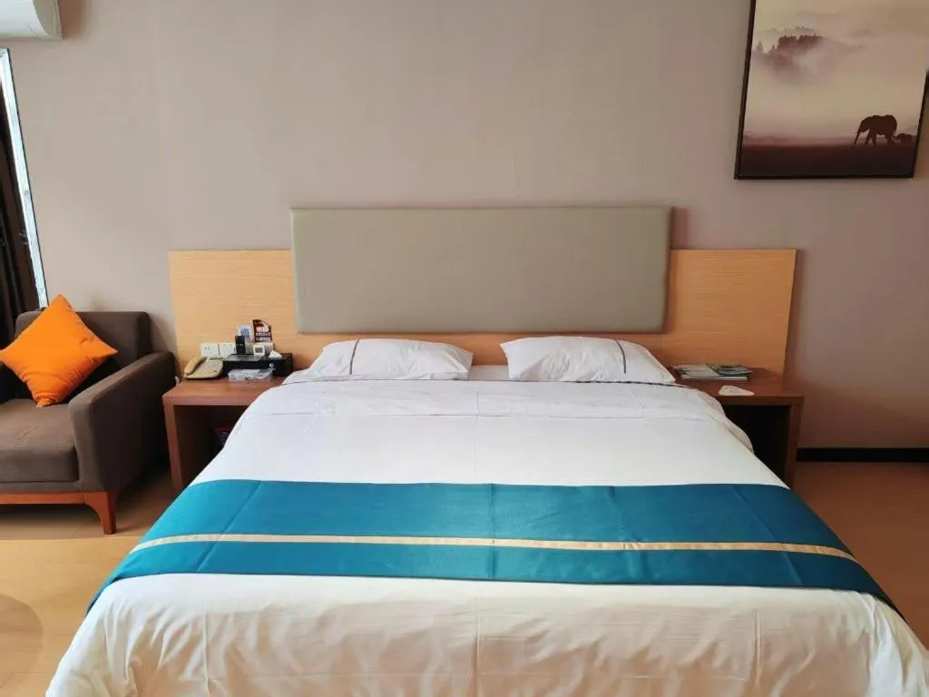 Bed in JTOUR Inn Maoming Gaozhou Guabangling Park