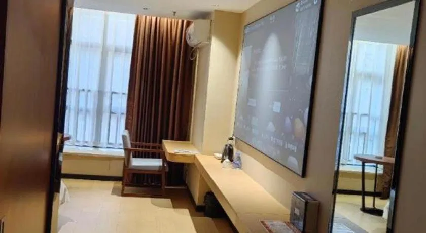 Bed in JTOUR Inn Maoming Gaozhou Guabangling Park