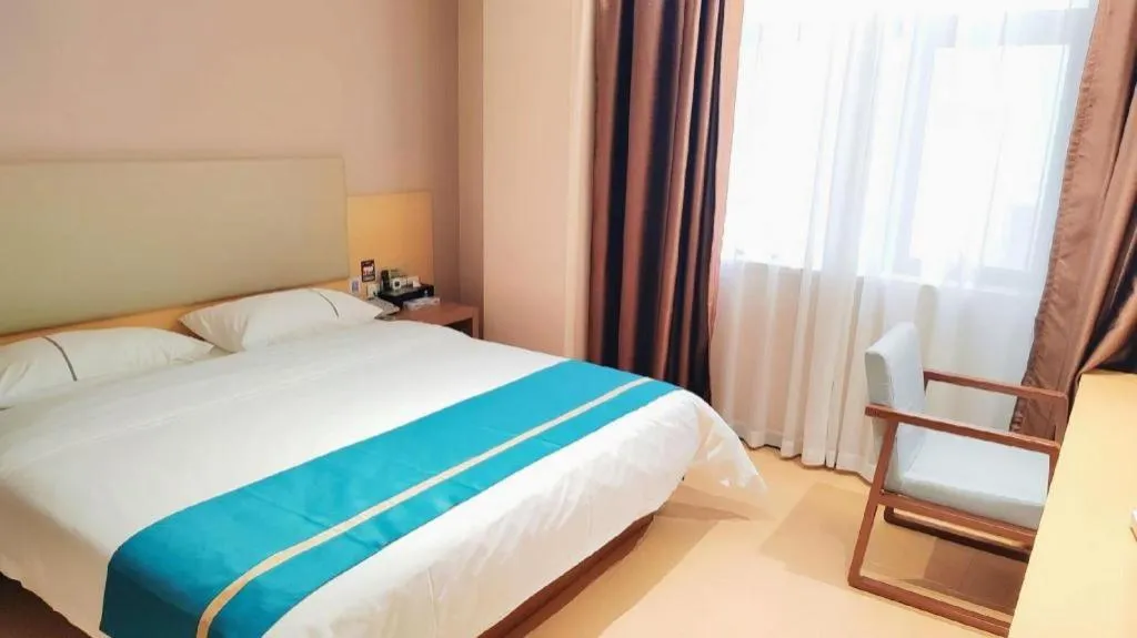 Bed in JTOUR Inn Maoming Gaozhou Guabangling Park