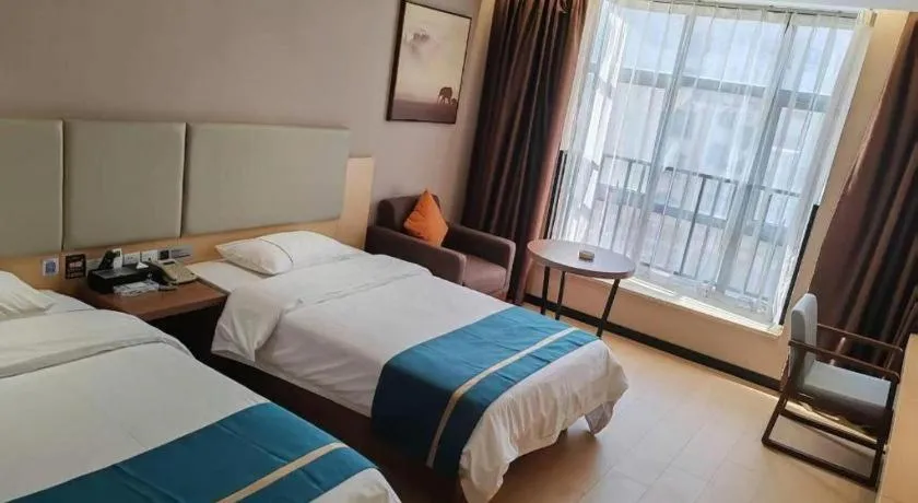 Bed in JTOUR Inn Maoming Gaozhou Guabangling Park