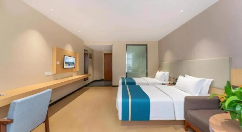 Bed in JTOUR Inn Maoming Gaozhou Guabangling Park