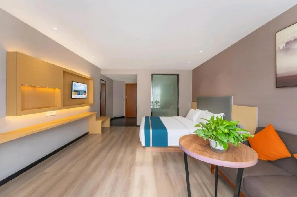 Bed in JTOUR Inn Maoming Gaozhou Guabangling Park
