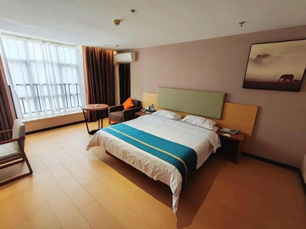 Bed in JTOUR Inn Maoming Gaozhou Guabangling Park