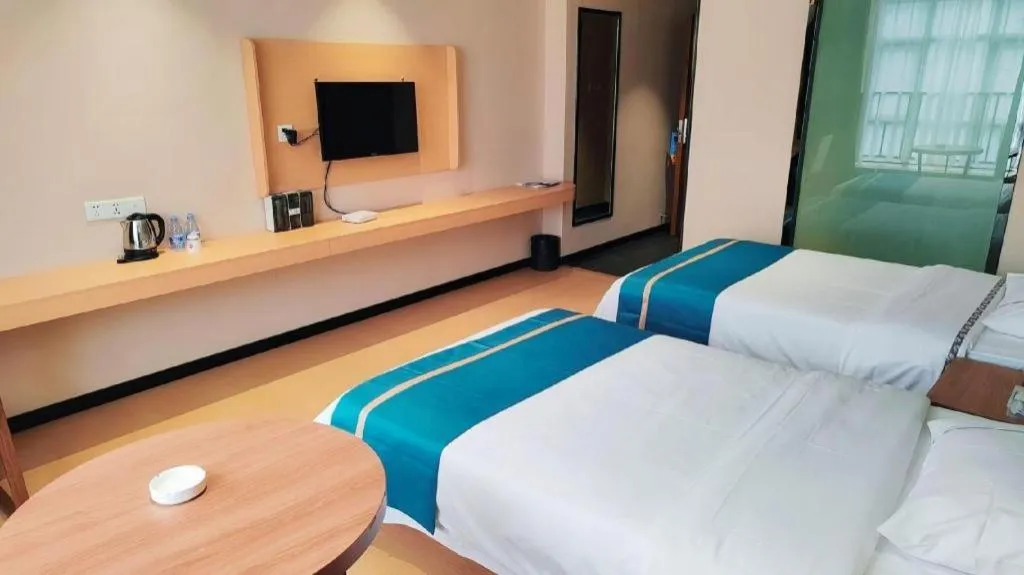 Bed in JTOUR Inn Maoming Gaozhou Guabangling Park