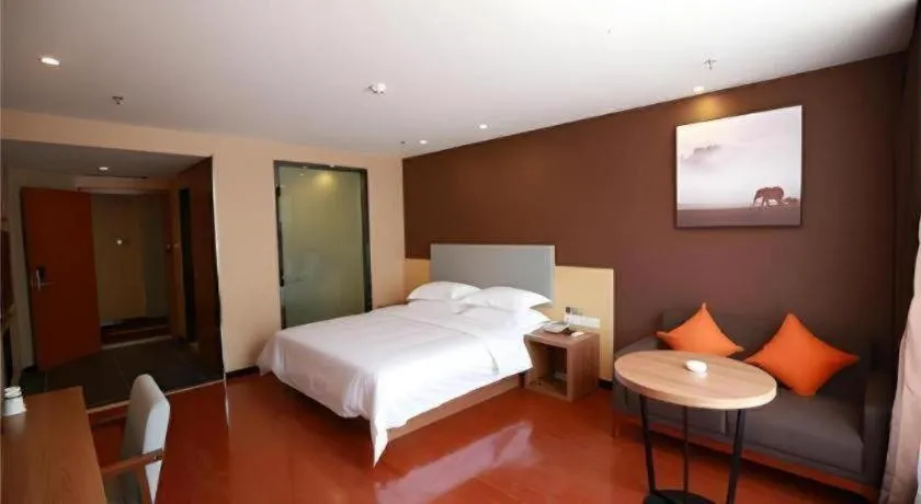 Bed in JTOUR Inn Maoming Gaozhou Guabangling Park