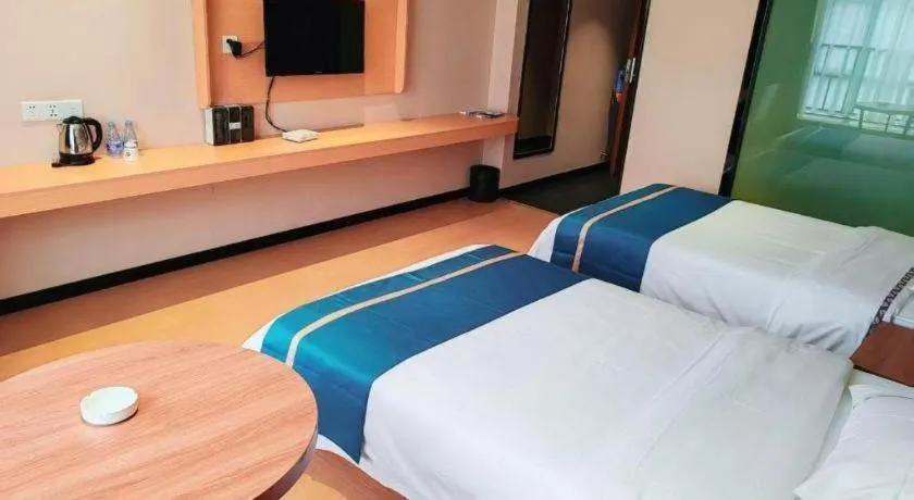 Bed in JTOUR Inn Maoming Gaozhou Guabangling Park
