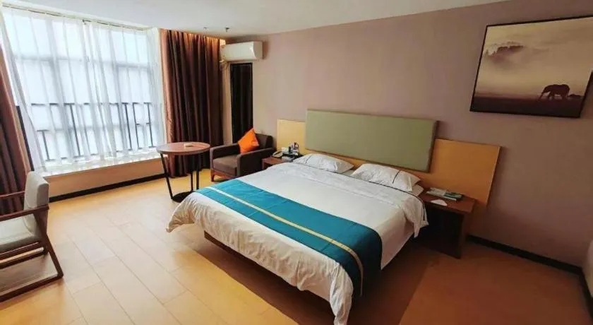 Bed in JTOUR Inn Maoming Gaozhou Guabangling Park