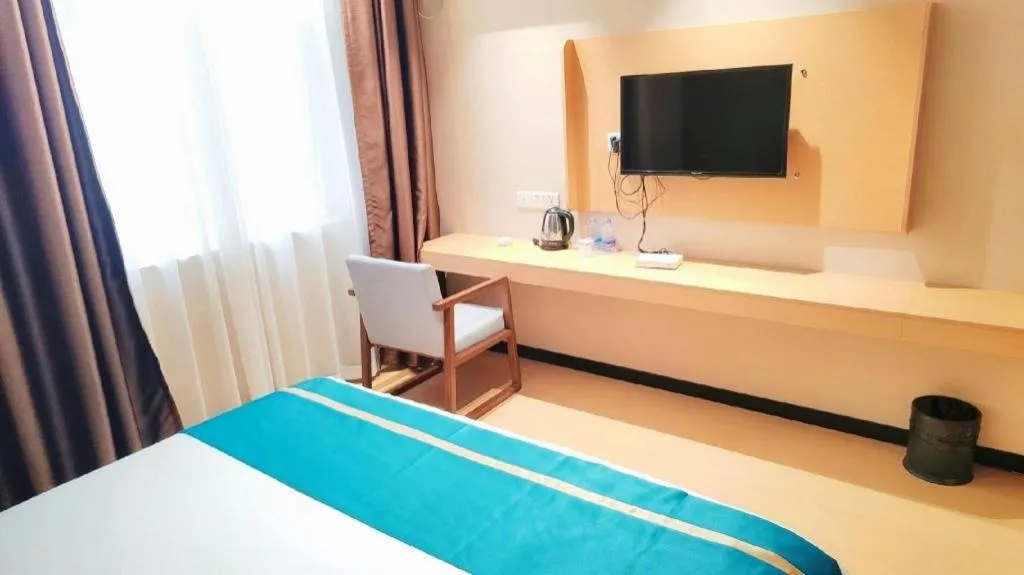 Bed in JTOUR Inn Maoming Gaozhou Guabangling Park
