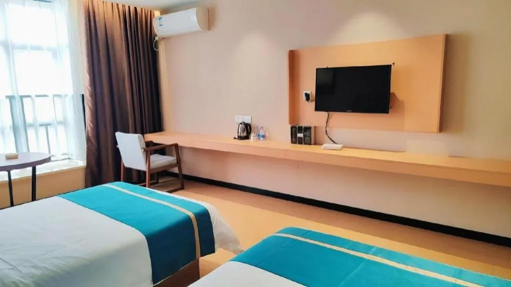 Bed in JTOUR Inn Maoming Gaozhou Guabangling Park