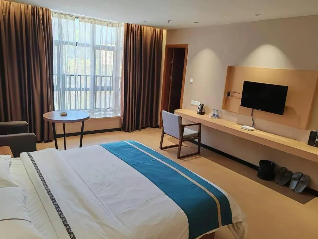 Bed in JTOUR Inn Maoming Gaozhou Guabangling Park