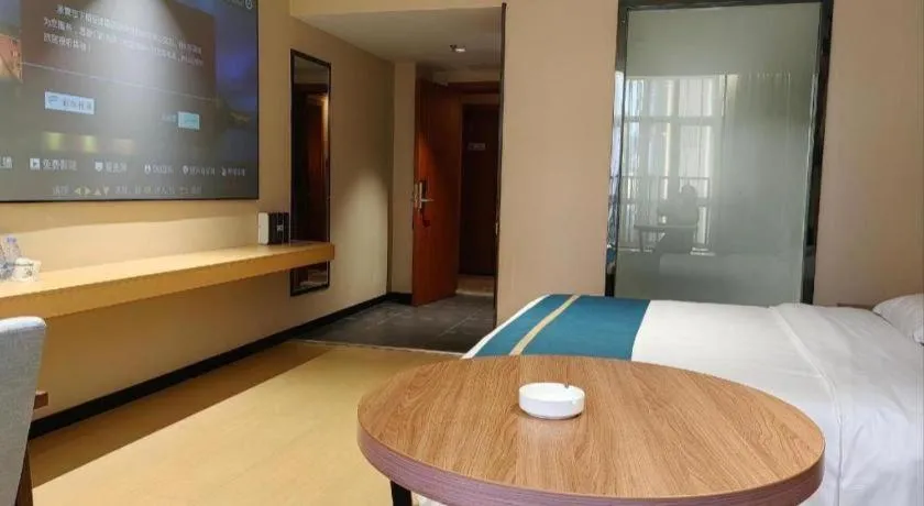 Bed in JTOUR Inn Maoming Gaozhou Guabangling Park