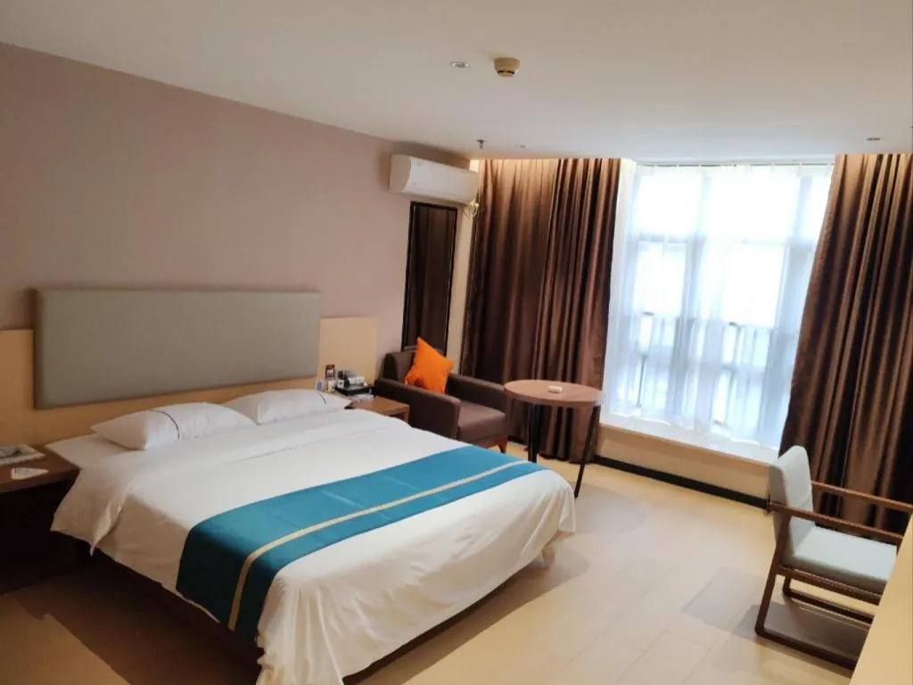 Bed in JTOUR Inn Maoming Gaozhou Guabangling Park