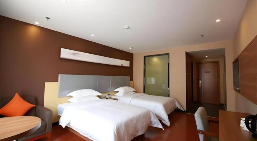 Bed in JTOUR Inn Maoming Gaozhou Guabangling Park