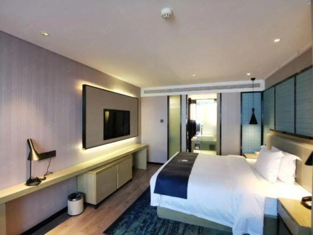 Bed in Echarm Hotel Wuhan Vanke Future Center Wulidun Metro Station