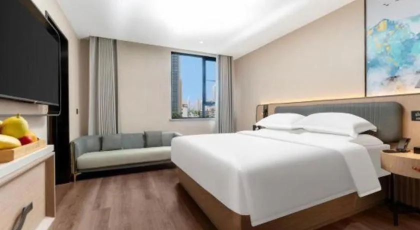 Bed in Echarm Hotel Wuhan Vanke Future Center Wulidun Metro Station