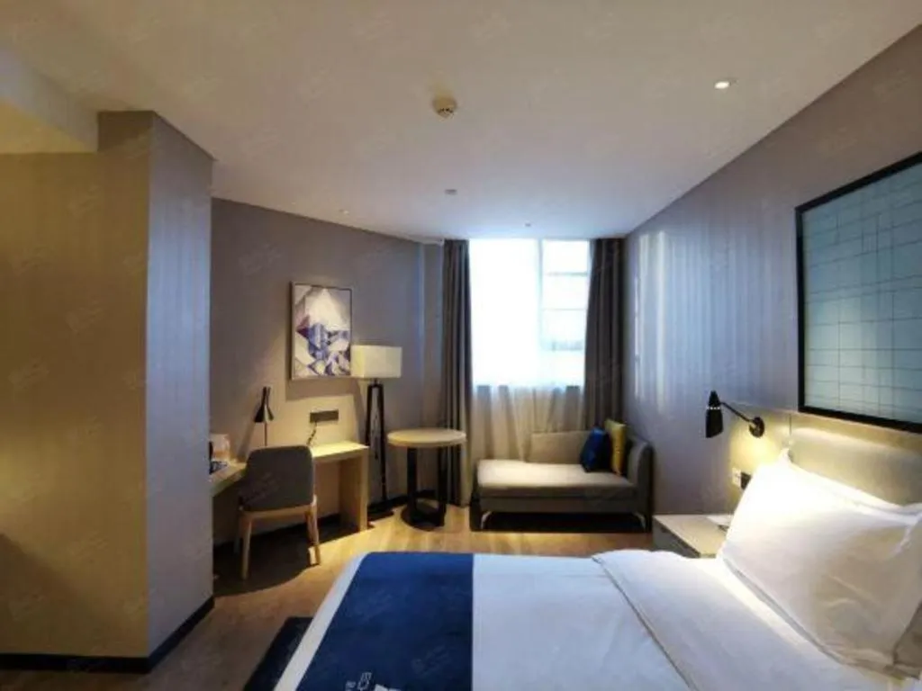 Bed in Echarm Hotel Wuhan Vanke Future Center Wulidun Metro Station