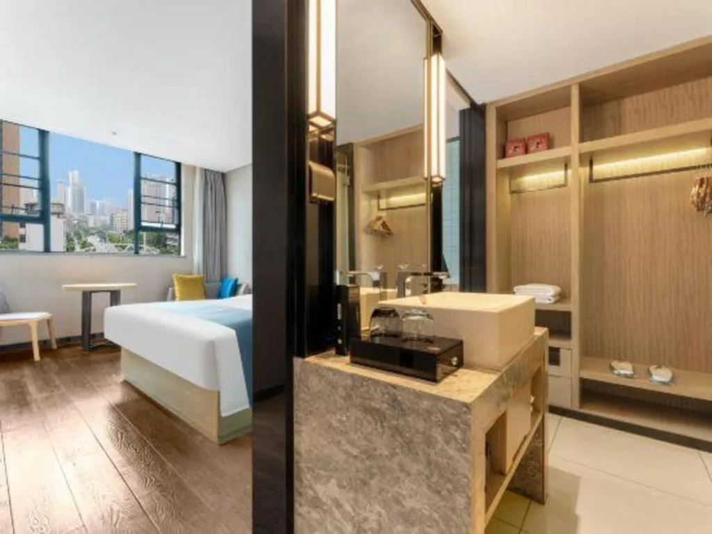 Bed in Echarm Hotel Wuhan Vanke Future Center Wulidun Metro Station