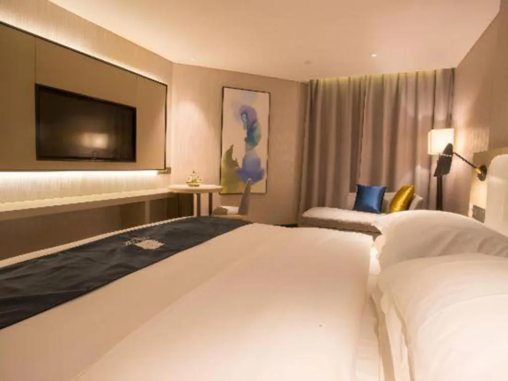Bed in Echarm Hotel Wuhan Vanke Future Center Wulidun Metro Station