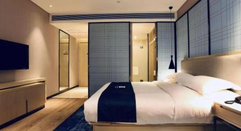 Bed in Echarm Hotel Wuhan Vanke Future Center Wulidun Metro Station