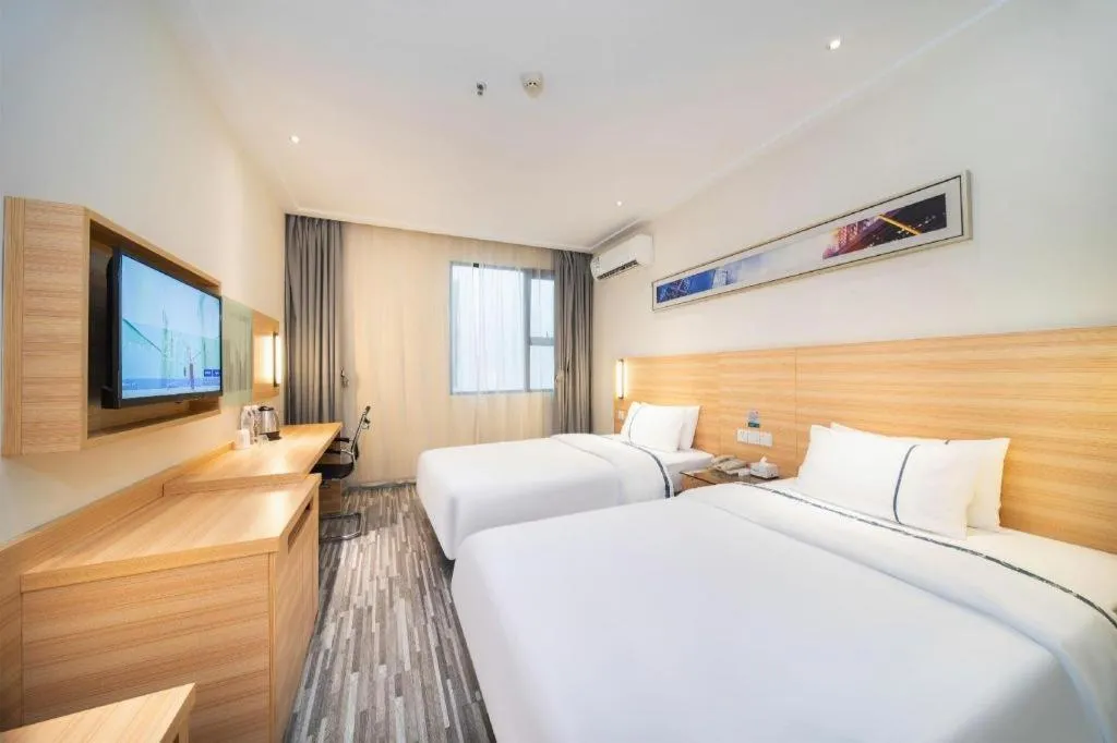 Bed in City Comfort Inn Wuhan East Lake Scenic Area Happy Valley