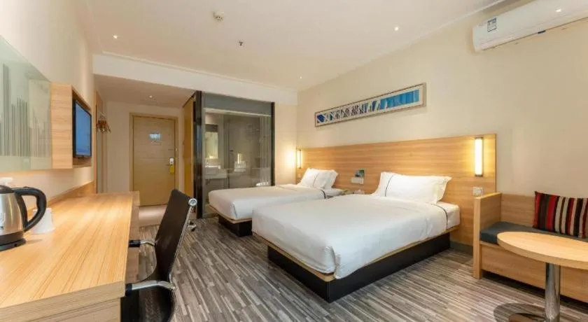 Bed in City Comfort Inn Wuhan East Lake Scenic Area Happy Valley