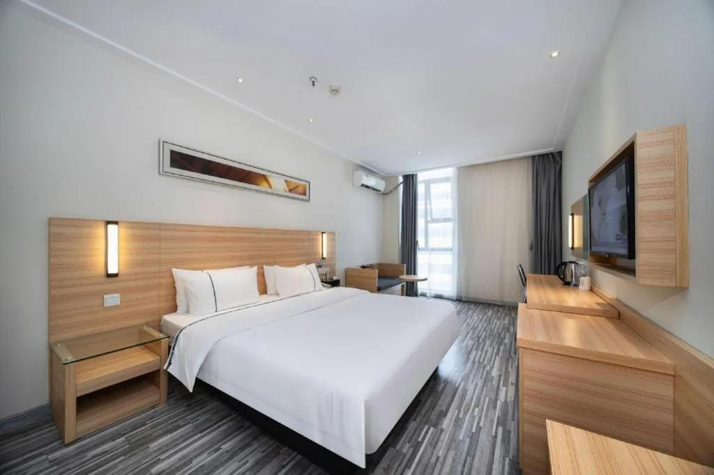 Bed in City Comfort Inn Wuhan East Lake Scenic Area Happy Valley