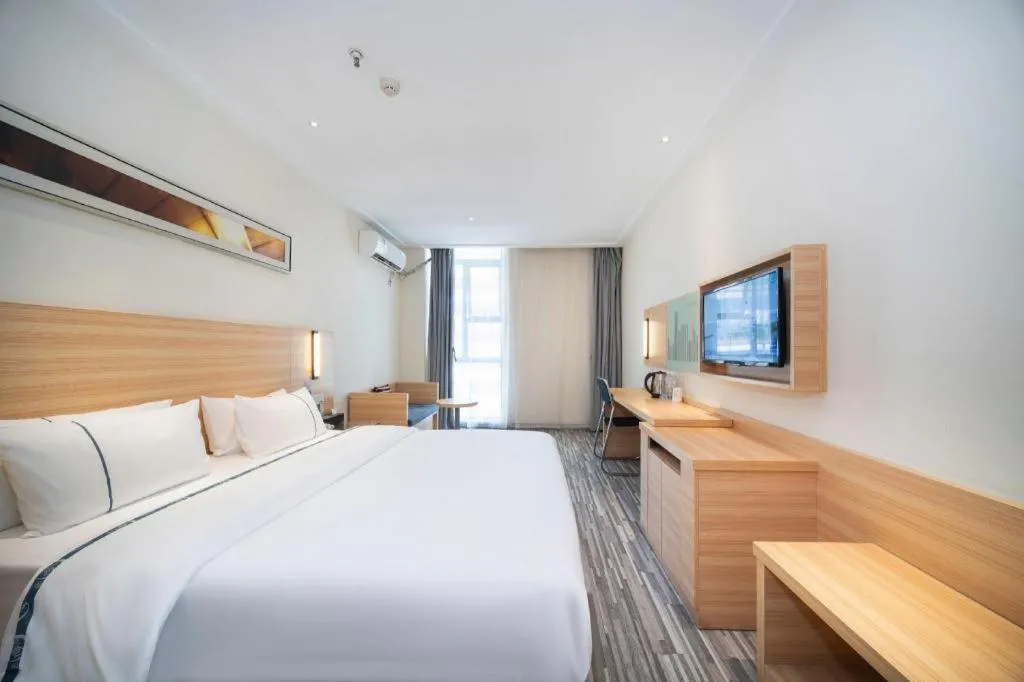 Bed in City Comfort Inn Wuhan East Lake Scenic Area Happy Valley