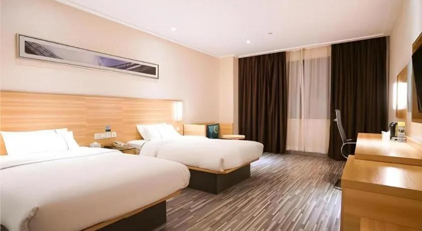 Bed in City Comfort Inn Wuhan East Lake Scenic Area Happy Valley