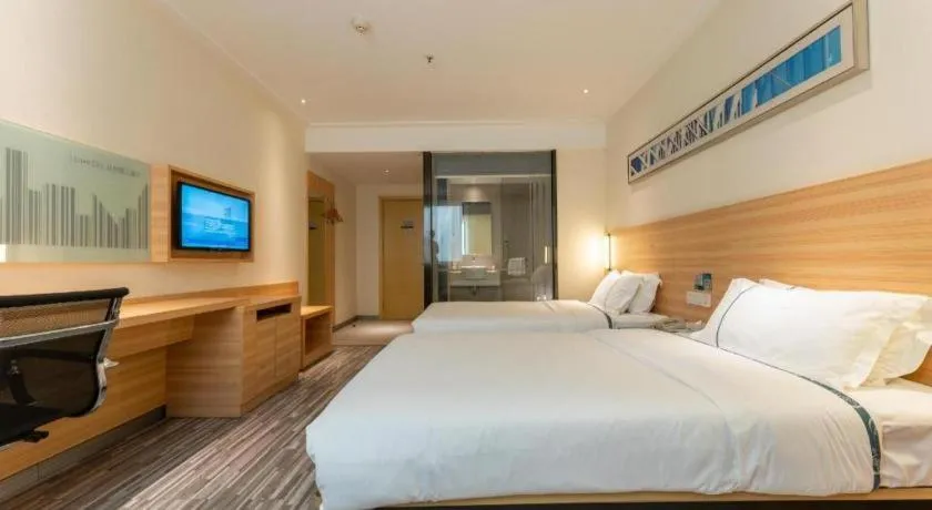 Bed in City Comfort Inn Wuhan East Lake Scenic Area Happy Valley