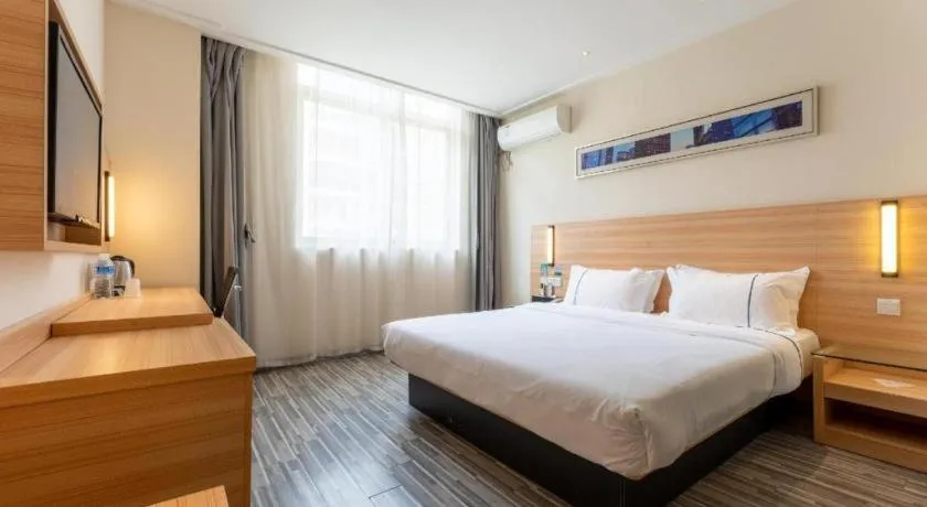 Bed in City Comfort Inn Wuhan East Lake Scenic Area Happy Valley