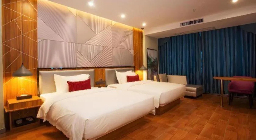 Bed in Borrman Hotel Fangchenggang High-speed Railway North Station Crystal International