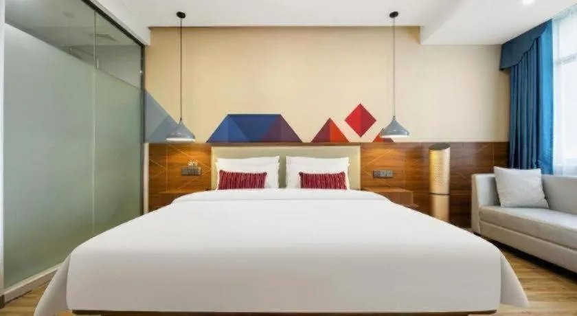 Bed in Borrman Hotel Fangchenggang High-speed Railway North Station Crystal International