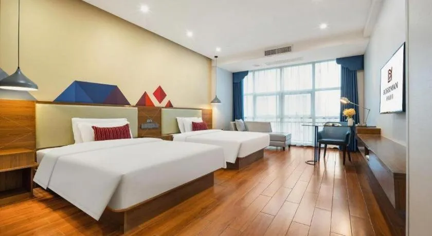 Bed in Borrman Hotel Fangchenggang High-speed Railway North Station Crystal International