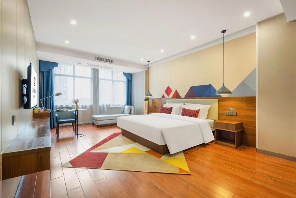 Bed in Borrman Hotel Fangchenggang High-speed Railway North Station Crystal International