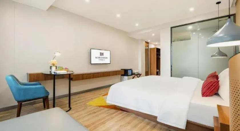 Bed in Borrman Hotel Fangchenggang High-speed Railway North Station Crystal International Bed in Borrman Hotel Fangchenggang High-speed Railway North Station Crystal International