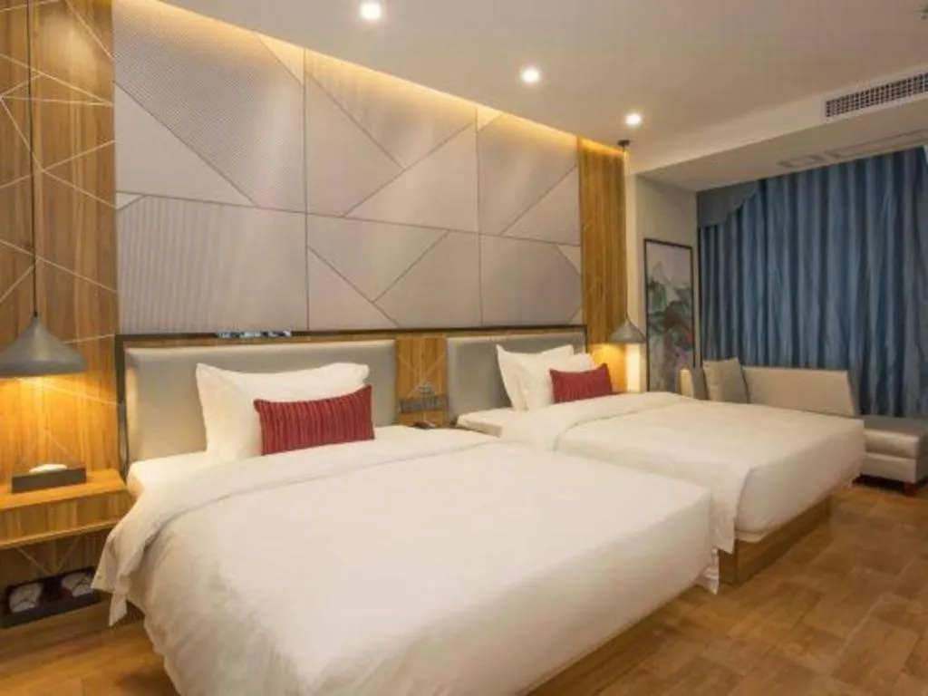 Bed in Borrman Hotel Fangchenggang High-speed Railway North Station Crystal International