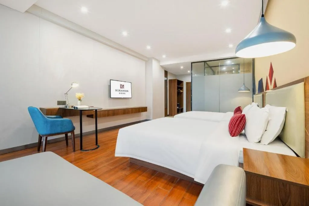 Bed in Borrman Hotel Fangchenggang High-speed Railway North Station Crystal International