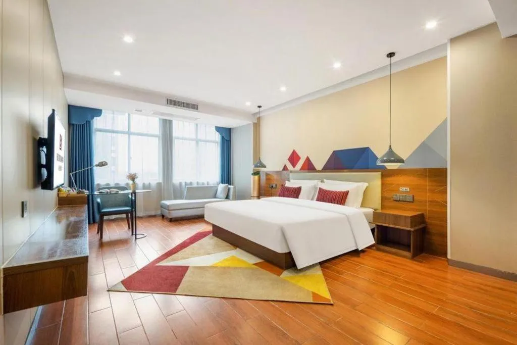 Bed in Borrman Hotel Fangchenggang High-speed Railway North Station Crystal International