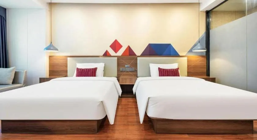 Bed in Borrman Hotel Fangchenggang High-speed Railway North Station Crystal International