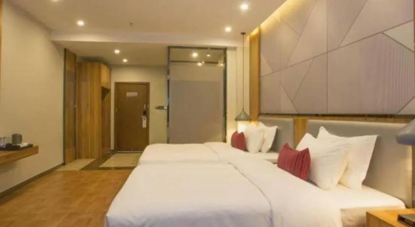 Bed in Borrman Hotel Fangchenggang High-speed Railway North Station Crystal International