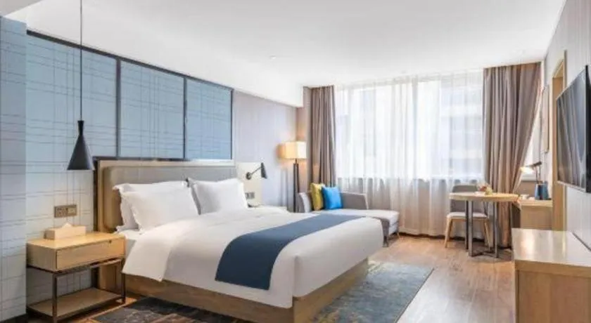 Bed in Echarm Hotel Zibo Gaoqing Zhongcheng Inernational