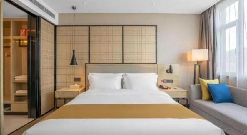 Bed in Echarm Hotel Zibo Gaoqing Zhongcheng Inernational